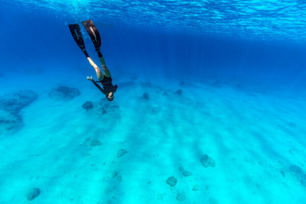 Freediving in the beautiful ocean water of the Turks and Caicos Islands