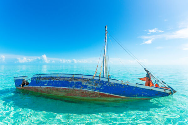 Sloop wreck in the shallow waters of the Caicos Banks