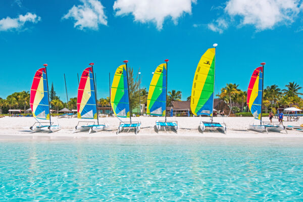 Hobie Cats with colourful sails at the Club Med all-inclusive resort on Grace Bay