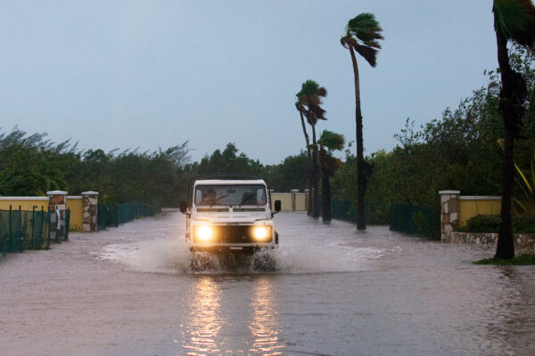 Land Rover Defender wading through floodwater in the Leeward area of Providenciales