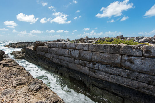 The limestone block wall at the inlet to the Grey Salina on Salt Cay