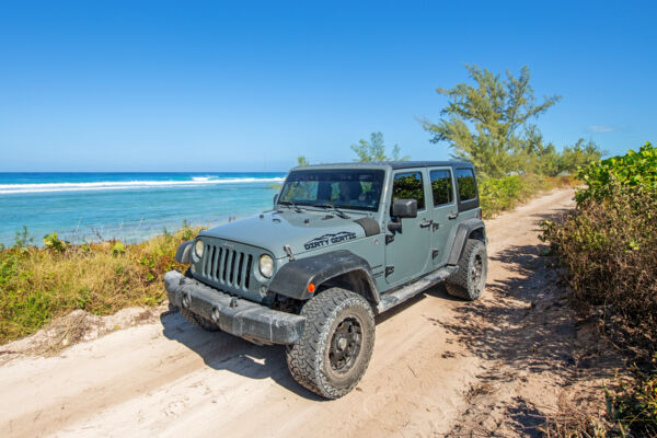 Jeep Wrangler at the coastal trail near Conch Bar on Middle Caicos