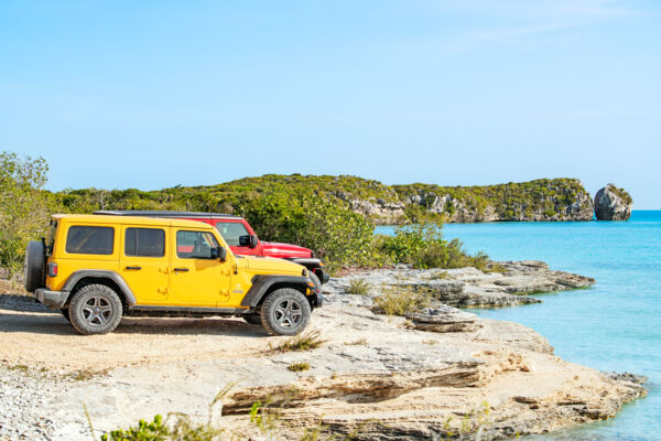 Jeeps parked near Split Rock, Providenciales, Turks and Caicos.