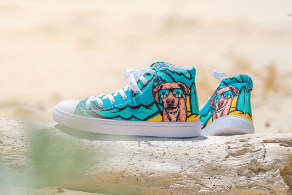 Potcake Vibez high-top canvas shoes made by Konk Apparel.