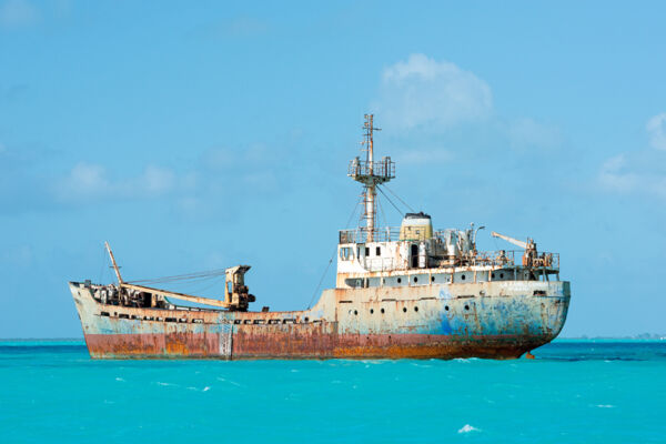 The La Famille Express shipwreck in the turquoise ocean off Long Bay Beach in the Turks and Caicos