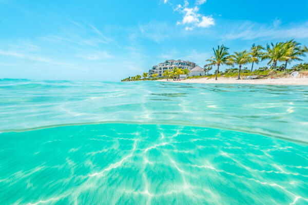 Over-under photo of Long Bay Beach and the Shore Club Resort in the Turks and Caicos