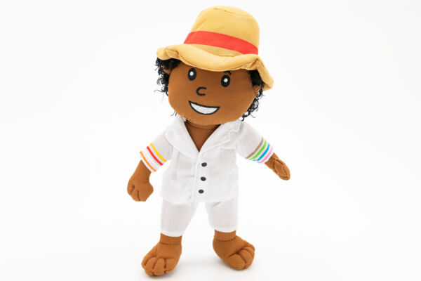 Locally made male doll wearing a white cotton outfit and a wide-brimmed hat.