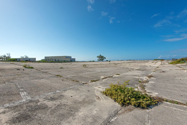 The expansive concrete rainwater collection field at the U.S. Navy NAVFAC 104 base on Grand Turk