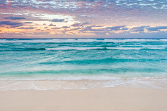 Colourful sunset on the beach at the Northwest Point Marine National Park in the Turks and Caicos