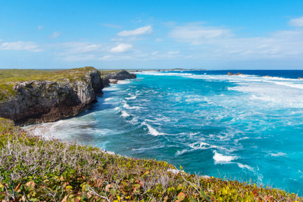 The high limestone cliffs and breaking waves at Mudjin Harbour on Middle Caicos