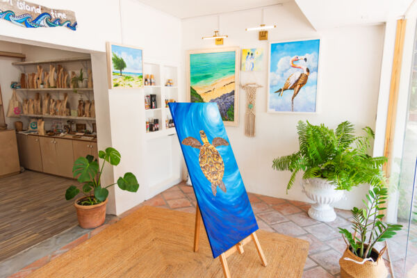 Tropical art gallery with paintings and gifts