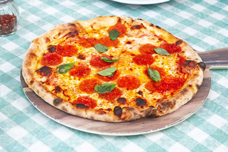 Thin-crust pepperoni pizza. 