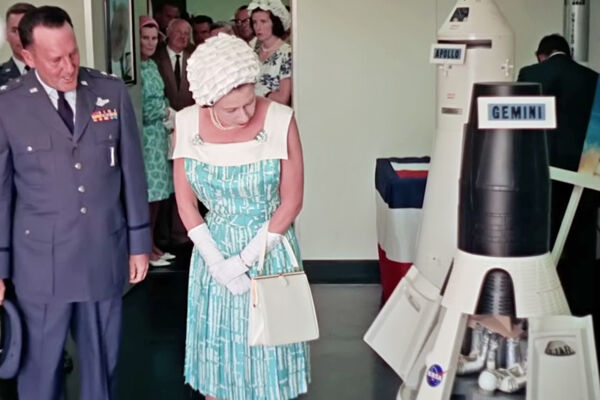 H.M. Queen Elizabeth on Grand Turk inspecting a model of the Friendship Seven space capsule