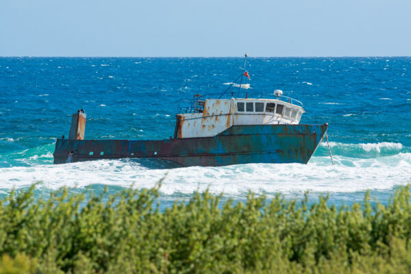 A Dominican transport ship grounded on the reef on the east coast of Salt Cay