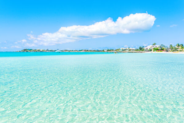 Calm water and vacation villas at Sapodilla Bay Beach on Providenciales