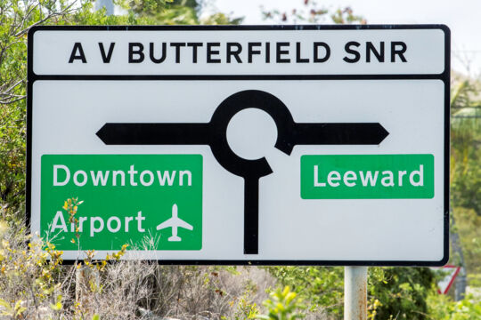 Road sign on Providenciales for Downtown and Leeward Highway