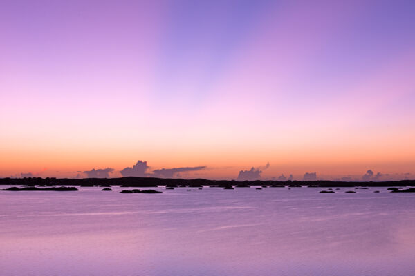 Purple sunset over Chalk Sound National Park in the Turks and Caicos