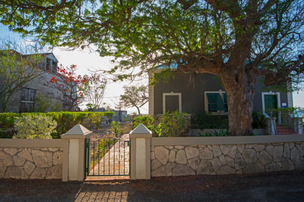 Gate and villa on Duke Street in Cockburn Town in the Turks and Caicos