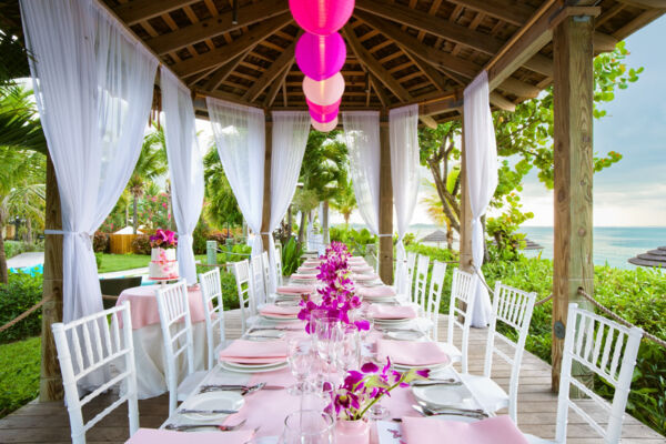 Beachfront wedding dinner setting at Grace Bay