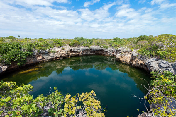 Karst-process water lens cave and pond on West Caicos