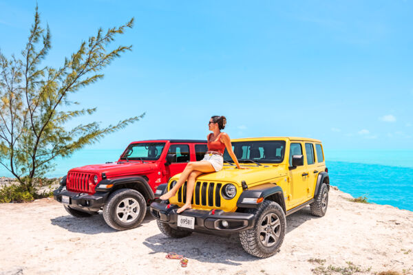 Turks and Caicos Jeep Wranglers parked by the ocean.
