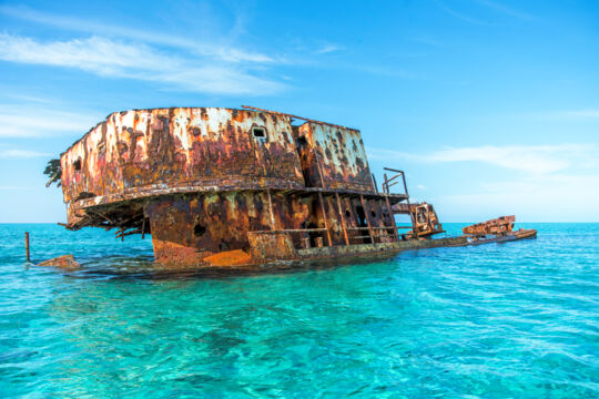 Steel shipwreck in shallow water on the Turks and Caicos barrier reef