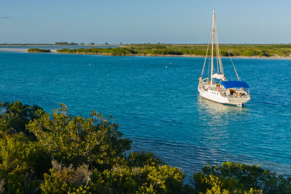 Small cruising yacht moored in Leeward Channel in the Turks and Caicos