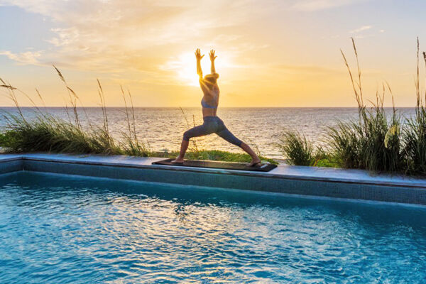 Yoga session at the pool at Sailrock Resort