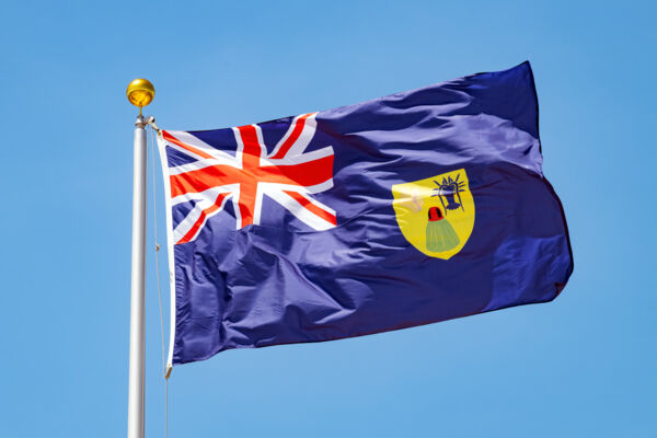 Turks and Caicos Islands flag blowing in the wind. 