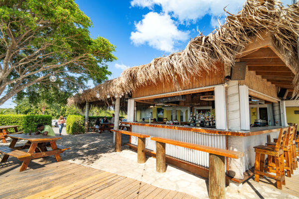 Thatch-roof bar and dining area at a local restaurant. 
