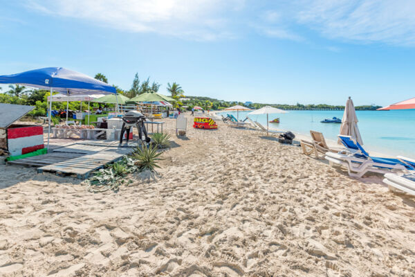 Vendor tents installed on a beach in Turks and Caicos.