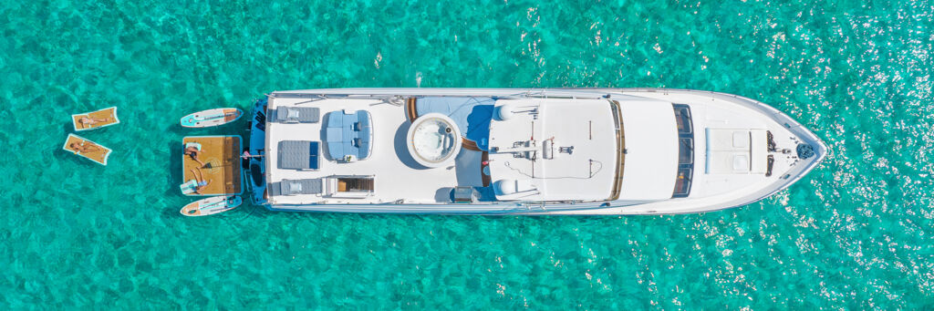Aerial image of a super yacht in Turks and Caicos.