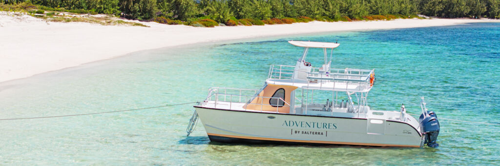 Scuba diving boat anchored at Salterra Beach, South Caicos. 