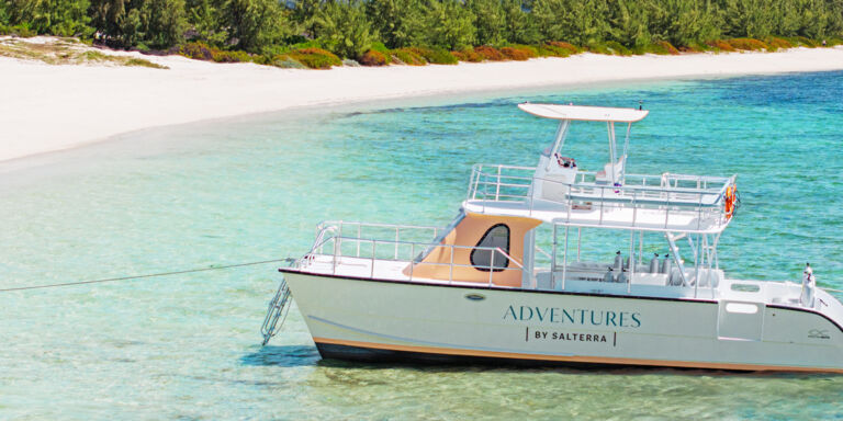 Scuba diving boat anchored at Salterra Beach, South Caicos. 