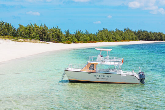 Tour boat anchored off Salterra Beach, South Caicos. 