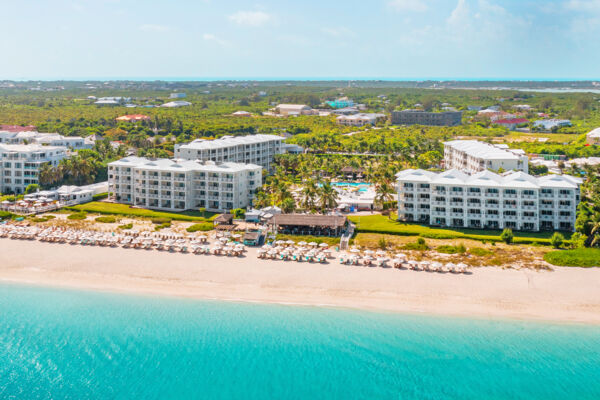 Caribbean resort located on a white-sand beach with turquoise water