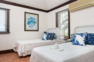 Two twin beds in bedroom at Alizee Villa