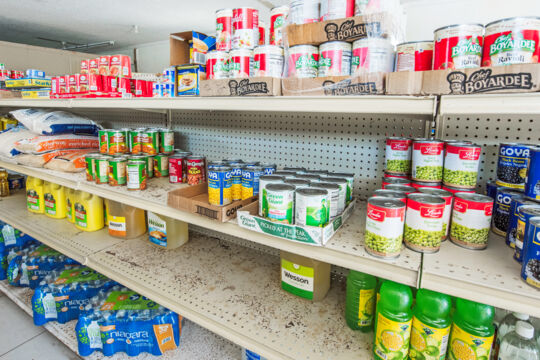 Canned food and cooking oil in a shop