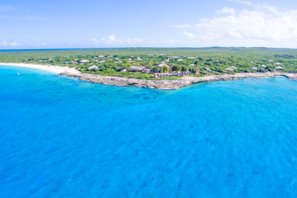 Clear turquoise ocean water and the secluded Amanyara Resort on Malcolm's Road Beach