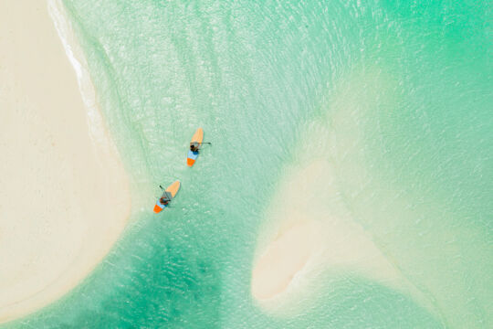 Paddleboarders at Little Ambergris Cay