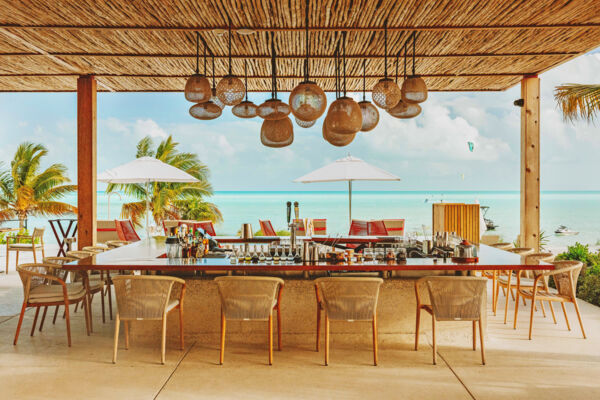 Beach bar with a turquoise ocean view. 