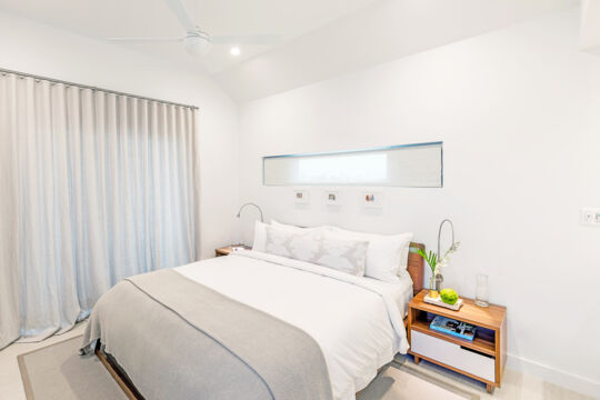 Simple and modern bedroom in a villa.