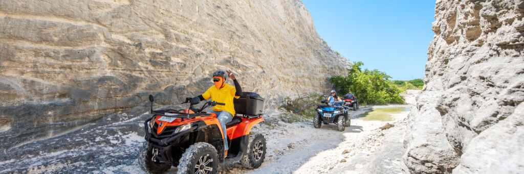 ATV tour group in the wetlands of North Creek on Grand Turk