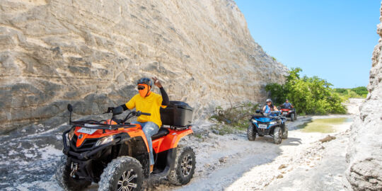 ATV tour group in the wetlands of North Creek on Grand Turk