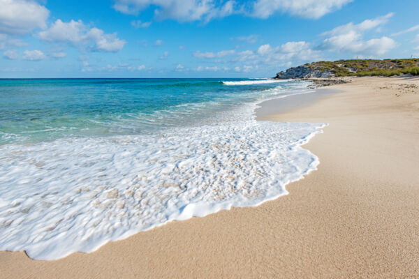 Sand and cliff at Balfour Town Beach in the Turks and Caicos