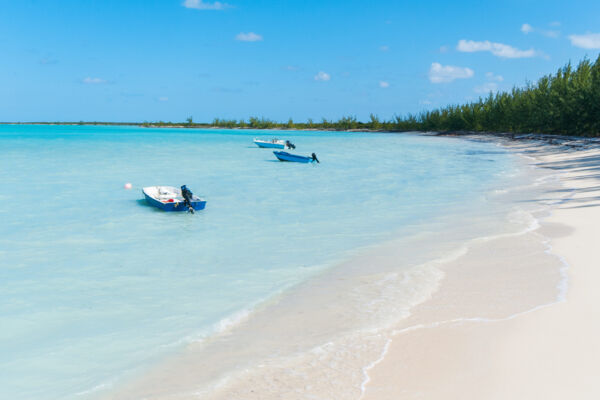 Small fishing motorboats anchored at Bambarra Beach