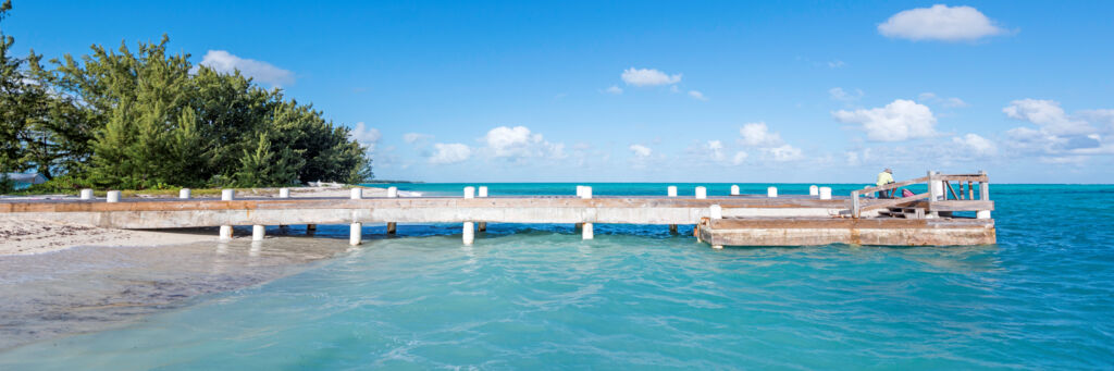 Small wood pier on the beach at Bambarra on Middle Caicos