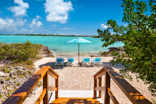 Small beach with loungers