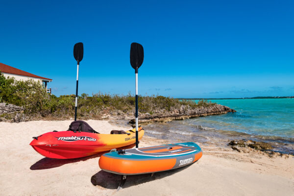 Kayaks on a small beach