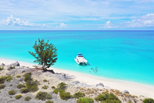 Power catamaran yacht at Water Cay in the Turks and Caicos